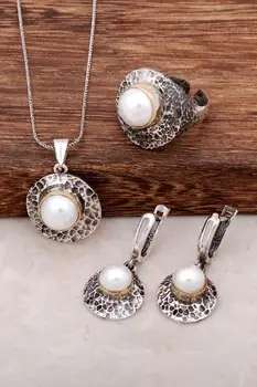 Hammer Forged Handmade Pearl Stone Design Silver Set 1992Hand Made Silver Jewellery Set
Hammer Forged Handmade Pearl Stone Design Silver Set 1992Hand Made Silver Jewellery Set