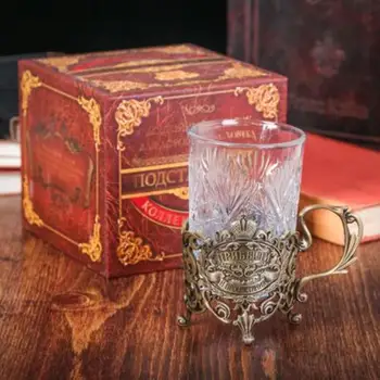 Cup holder with a glass of profit and prosperity (1784366)
Cup holder with a glass of profit and prosperity (1784366)