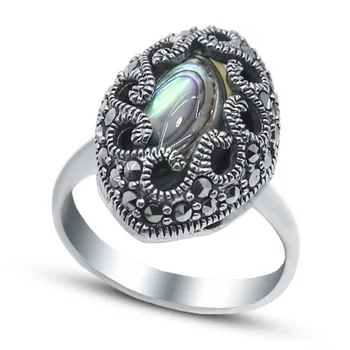 Silver Wings ring with mother of pearl and marcasite in silver 
Silver Wings ring with mother of pearl and marcasite in silver