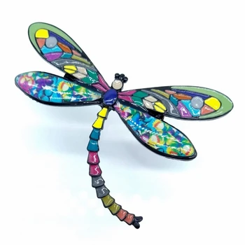 Multi-colored dragonfly-shaped enamelled brooch an original design for women.
Multi-colored dragonfly-shaped enamelled brooch an original design for women.