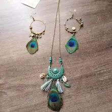 Nuevo estilo Tassel Peacock Feather Bohemio Collar largo Shell Suéter Cadena de cuero Joyería Exagerado Diseño Envío de la gota