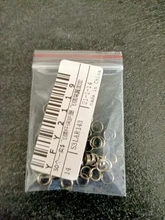 Dardos y anillos profesionales de acero plateado, accesorios de eje de Dardos, muelles de nailon, 50 unids/lote, I6M9