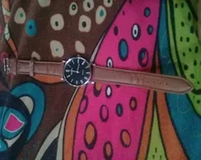 Pulsera de cuarzo para hombre, reloj analógico de negocios con correa de cuero sintético, diseño con números romanos y efecto Blu-ray