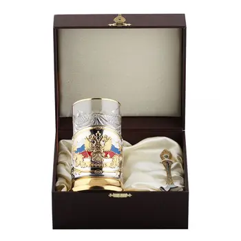 Cup holder nickel plated with gilding and enamel coat of arms tricolor in a case
Cup holder nickel plated with gilding and enamel coat of arms tricolor in a case