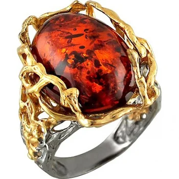 Esthete ring with Amber made of black silver with gilding
Esthete ring with Amber made of black silver with gilding