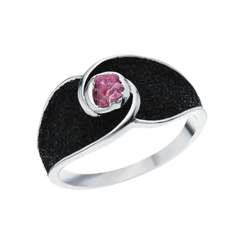 Silver ring with rubies, corundum and sunlight glitter sample 925 test 
Silver ring with rubies, corundum and sunlight glitter sample 925 test