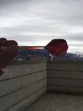 Eje para dardos-colas de dardos a juego