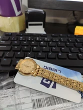 Oro par reloj mujer relojes de cuarzo moda impermeable completa de acero inoxidable relojes de pulsera Parejas Regalos L1014 de los hombres