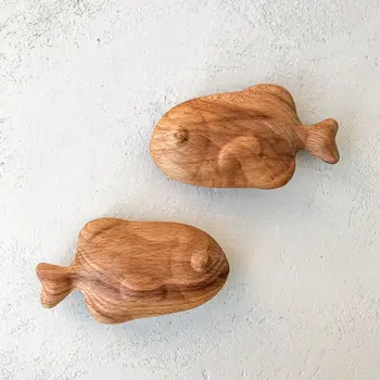 Деревянная погремушка "Рыбка" из бука, внутри семена гречихи 
Деревянная погремушка "Рыбка" из бука, внутри семена гречихи