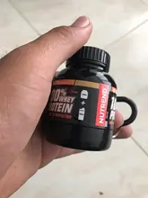 1PC 100ML portátil botella para polvo de proteína con llavero de salud embudo medicina publicidad botella de agua vaso botella para deporte al exterior