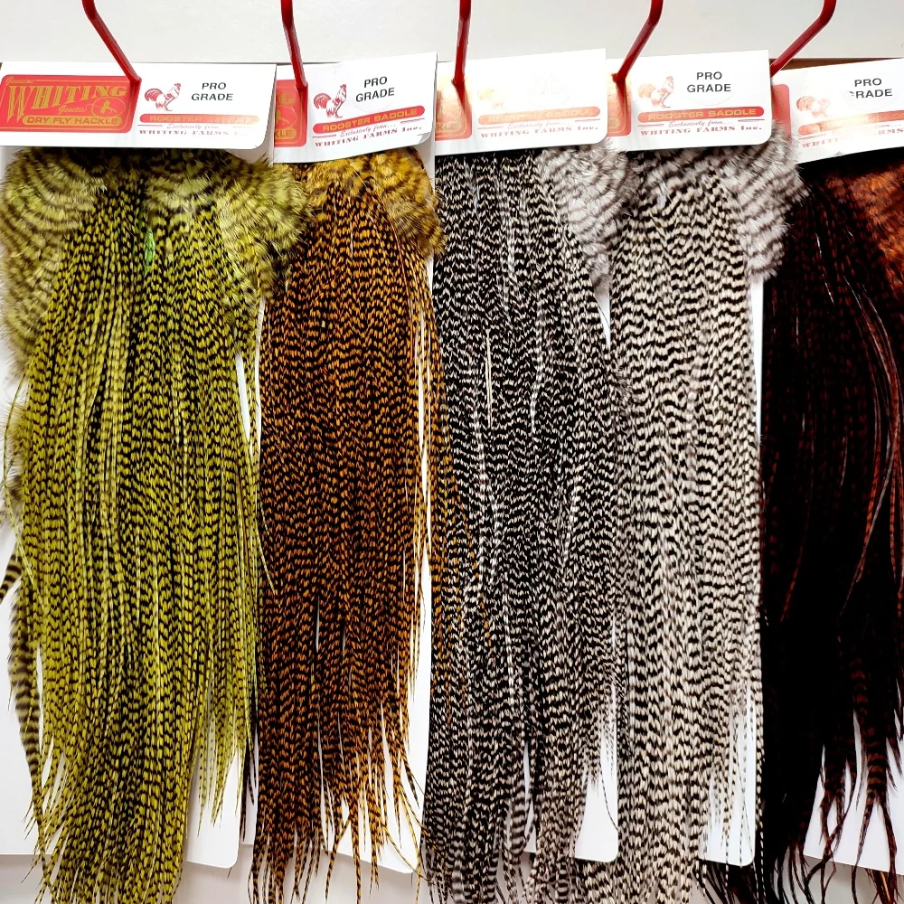 Individual feathers 10 pcs. Grizzly PRO GRADE. From the saddle of a rooster Whiting. 20 to 35 cm . For knitting fly fishing flies | Спорт и