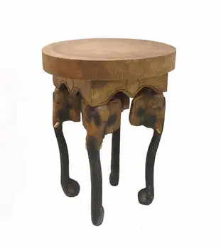 Table on 4 legs of trunk
Table on 4 legs of trunk