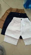 Pantalones cortos de colores sólidos para niños y niñas, ropa de playa, tejido blanco caramelo, talla 90 ~ 130