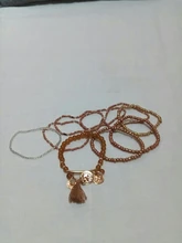 Conjunto de pulseras elásticas multicapa para mujer, joyería Bohemia, brazaletes con borla, moneda de oro, encanto de cuentas de cristal, regalo para mujer