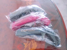 Sacacorchos creativo para bebidas, lanzador de tapón volador, herramienta portátil para barra de pistola, tapas en forma de apertura de cerveza, tirador de lata roja