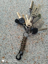 Al aire libre llavero anillo de mosquetón cuerda de paracaídas militar cuerda de Kit de supervivencia para acampada de emergencia nudo abridor de botella de herramientas