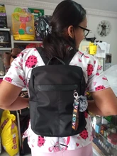 Mochila sencilla de viaje para mujer, bolso escolar Oxford de gran capacidad, informal, con Bola de Pelo, para adolescentes