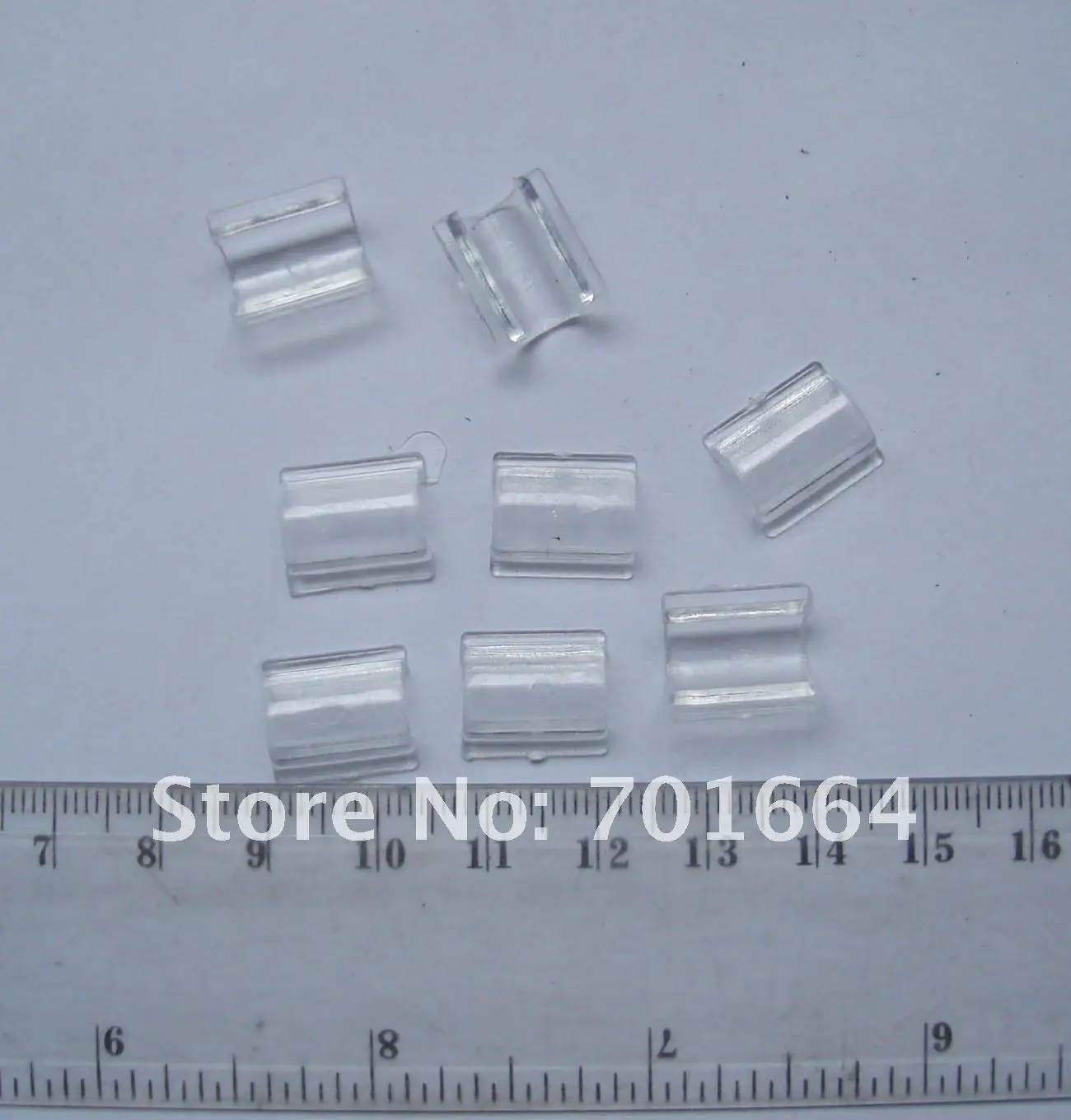 Bargain for Bulk Stardand Large size transparent white plastic cuffs for attaching accessories on elastic bands