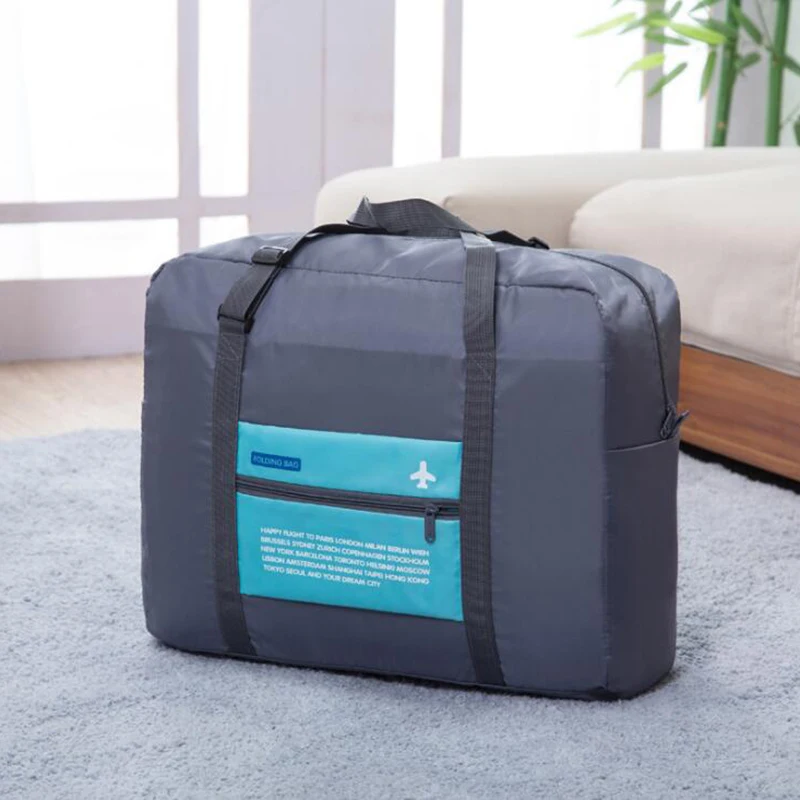 Portable folding bag Polyester waterproof clothing storage bag large capacity bag aircraft package
Portable folding bag Polyester waterproof clothing storage bag large capacity bag aircraft package