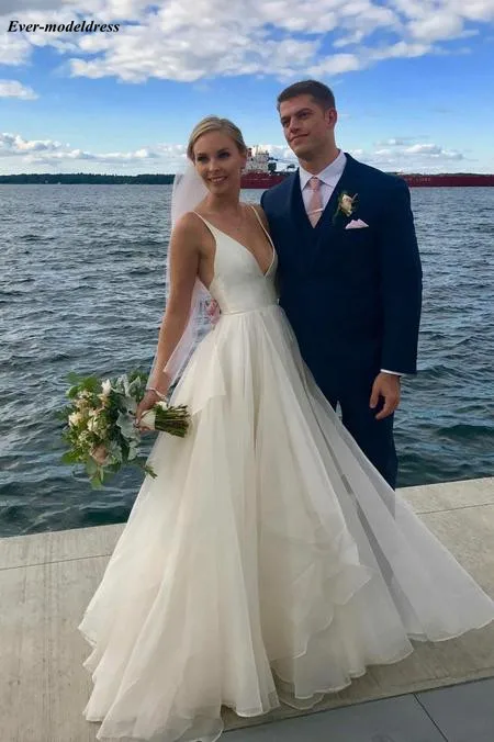 Beach Wedding Dresses Boho 2019 V-Neck Open Back Sweep Train A-Line Bridal Gowns Vestido de noiva Robe De Mariee Customized
Beach Wedding Dresses Boho 2019 V-Neck Open Back Sweep Train A-Line Bridal Gowns Vestido de noiva Robe De Mariee Customized