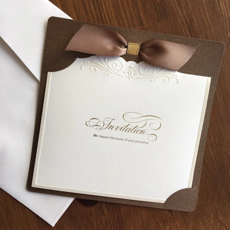 L013 Elegant Wedding Invitation card classic desing while color with satin bow, 10 pcs per pack , 15*15cm
L013 Elegant Wedding Invitation card classic desing while color with satin bow, 10 pcs per pack , 15*15cm