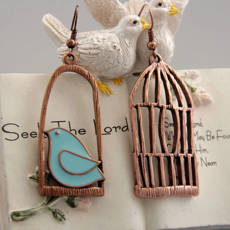 Fashion Creative Bronze Birdie And Birdcage Earrings Irregular Design Vintage Enamel Feminine Charm Earrings Special Gift 
Fashion Creative Bronze Birdie And Birdcage Earrings Irregular Design Vintage Enamel Feminine Charm Earrings Special Gift