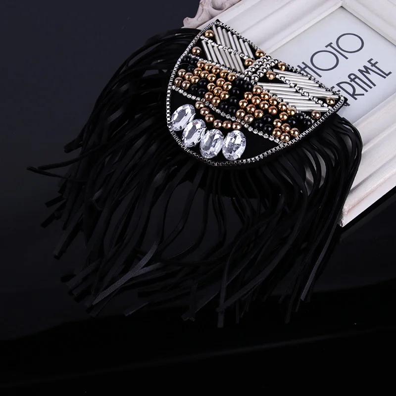 2 pieces / Korean version of men and women rock punk tassels shoulders suit brooch accessories singer band costumes decorations
2 pieces / Korean version of men and women rock punk tassels shoulders suit brooch accessories singer band costumes decorations