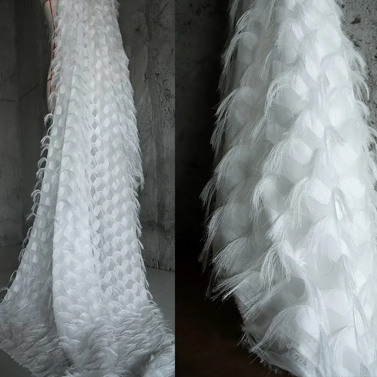 Exquisite cut flower three-dimensional feather tassel fabric Perspective texture mesh fashion fabric
Exquisite cut flower three-dimensional feather tassel fabric Perspective texture mesh fashion fabric