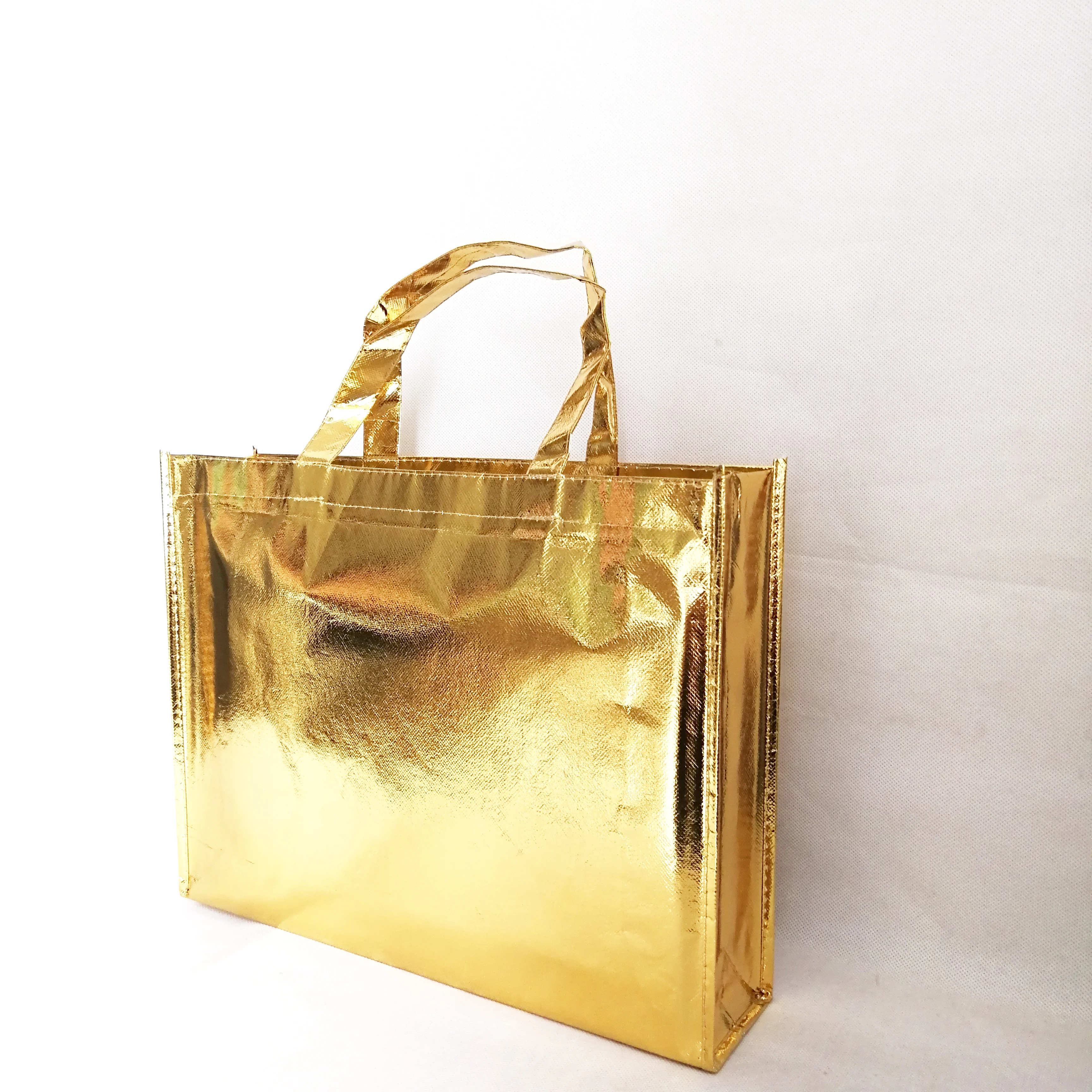 100pcs/lot Luxury Gift Bags with Handles Multi-use Gold Laminated Non Woven Bags Clothes Wig Packaging Bag Halloween Party Favor
100pcs/lot Luxury Gift Bags with Handles Multi-use Gold Laminated Non Woven Bags Clothes Wig Packaging Bag Halloween Party Favor