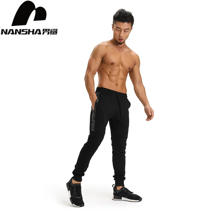 NANSHA Brand Mens Cotton Sweatpants Gyms Fitness Bodybuilding Trousers Male Solid Sportswear Casual Fashion Pencil Pants
NANSHA Brand Mens Cotton Sweatpants Gyms Fitness Bodybuilding Trousers Male Solid Sportswear Casual Fashion Pencil Pants