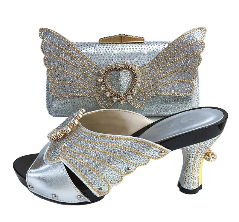 African aso ebi wedding party shoes slippers and clutches bag SB8246-1 hand-made design with size 37 to 43 shoe bag silver color
African aso ebi wedding party shoes slippers and clutches bag SB8246-1 hand-made design with size 37 to 43 shoe bag silver color