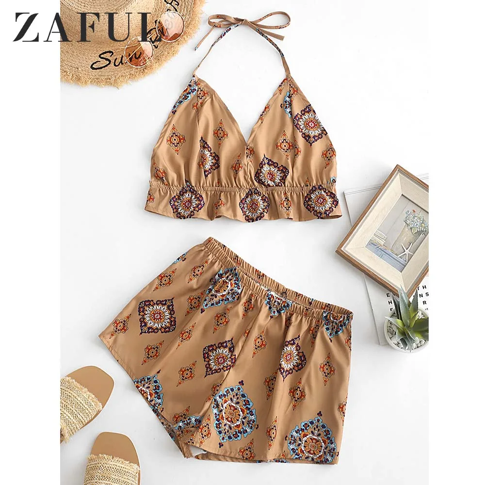 ZAFUL Halter Printed Flounces Top And Shorts Set Vintage High Waist Two Pieces Set Sleeveless V-Neck Lace Up Ruffles Crop Top
ZAFUL Halter Printed Flounces Top And Shorts Set Vintage High Waist Two Pieces Set Sleeveless V-Neck Lace Up Ruffles Crop Top