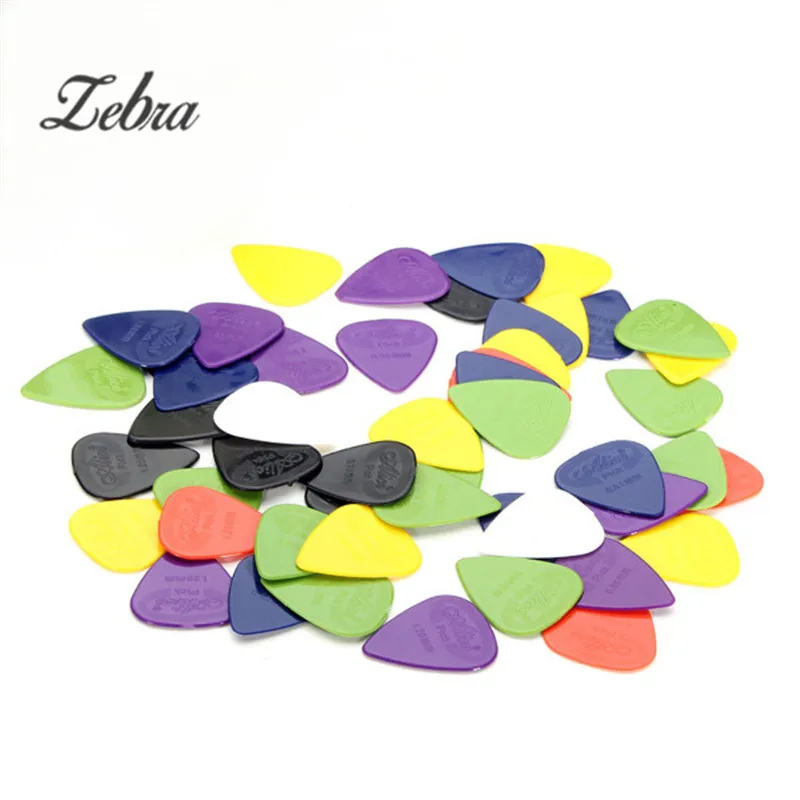 50Pcs/Set Electric Guitar Pick Acoustic Guitarra Picks Plectrum Celluloid 0.58/0.71/0.81/0.96/1.20/1.50mm Guitar Accessories
50Pcs/Set Electric Guitar Pick Acoustic Guitarra Picks Plectrum Celluloid 0.58/0.71/0.81/0.96/1.20/1.50mm Guitar Accessories
