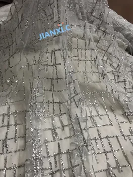 shinny JIANXI.C-11896 glued glitter sparkle african india mesh tulle for dress sawing 5yards/lot
shinny JIANXI.C-11896 glued glitter sparkle african india mesh tulle for dress sawing 5yards/lot