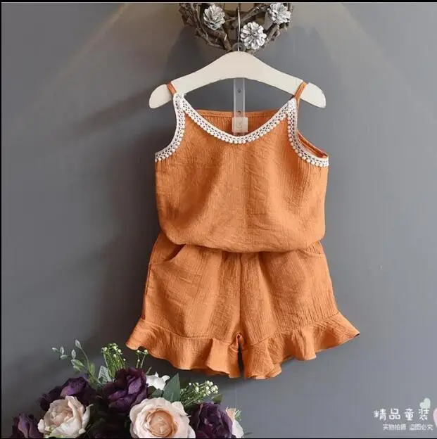 2018 girls summer children's clothing new fashion lace halter shirt ruffle shorts two sets of cool clothes
2018 girls summer children's clothing new fashion lace halter shirt ruffle shorts two sets of cool clothes