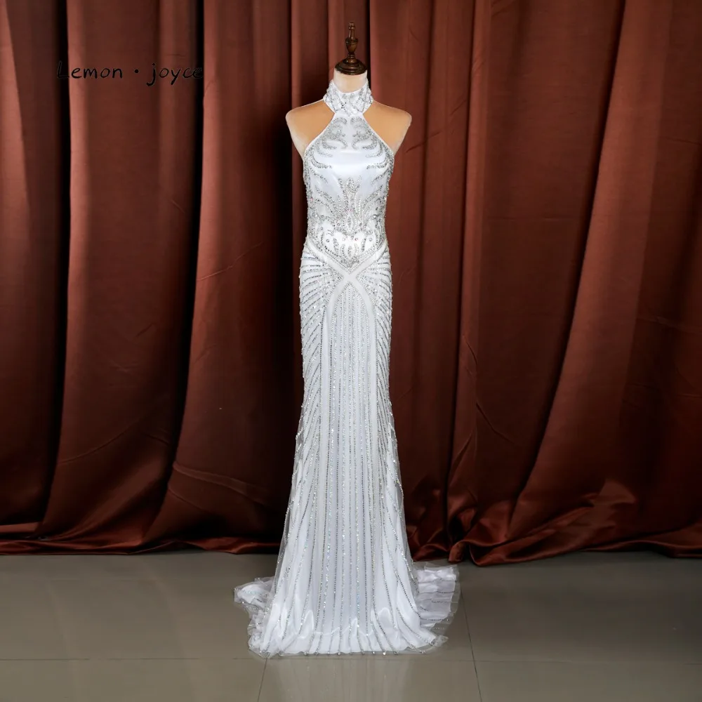 Lemon joyce 2019 New Style White Evening Dress Halter Neck Full Beading With Sexy Cut-out Back Floor Length Elegant Lady Gown
Lemon joyce 2019 New Style White Evening Dress Halter Neck Full Beading With Sexy Cut-out Back Floor Length Elegant Lady Gown