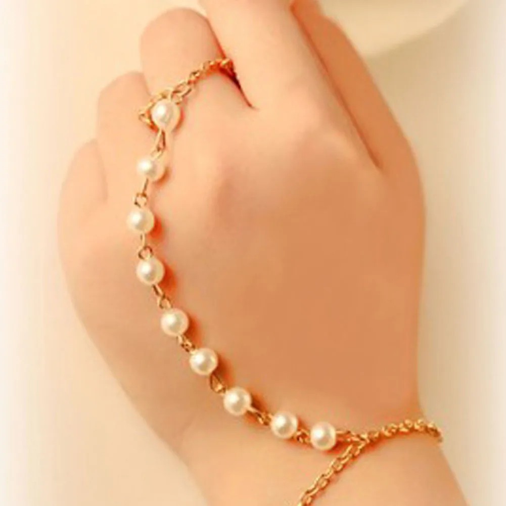 New Arrival Fashion Jewelry Beautiful Imitation Pearls Chain Linked Finger Loop Bracelet Elegant Women's Wire hand Harness Ring
New Arrival Fashion Jewelry Beautiful Imitation Pearls Chain Linked Finger Loop Bracelet Elegant Women's Wire hand Harness Ring