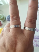 Anillo de boda de acero inoxidable con circonitas cruzadas para mujer, niña y hombre, 2021