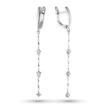Earrings in white gold with a diamond 
Earrings in white gold with a diamond