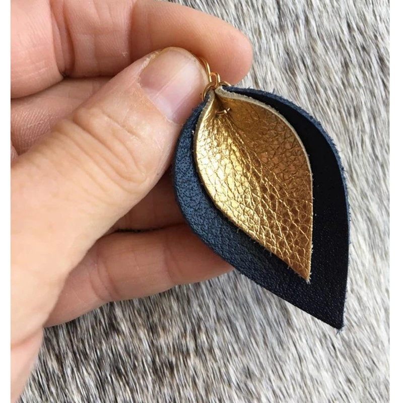 stock new two layers leather earrings navy blue and gold metallic leather layered leaf lightweight dangle earrings
stock new two layers leather earrings navy blue and gold metallic leather layered leaf lightweight dangle earrings