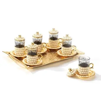 TurkishGoldteaPearl Coated Gold Turkish Tea Cup Six Personality Set Twenty-five pieces and stylish rectangular presentation tray
TurkishGoldteaPearl Coated Gold Turkish Tea Cup Six Personality Set Twenty-five pieces and stylish rectangular presentation tray