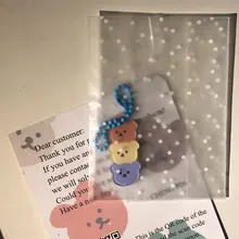 Llaveros de dibujos animados de cereza, Ángel y oso, funda de Metal para auriculares, colgante para chicas, mochila para estudiantes, baratijas de dibujos animados, joyería Kawaii