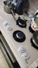 2 uds bebé protectora de seguridad tapa para cocina a Gas mando horno cubierta candado tapa de bloqueo Protector bebé cocina chico Accesorios