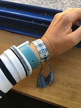 Pulsera de algodón para hombre y mujer, brazalete ajustable con borlas tejidas, Color bordado, hecho a mano