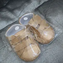 Zapatillas de suela blanda para bebé recién nacido, zapatos para niño de 1 año, calzado para niño pequeño, zapatos de cuna de cuero para niño, regalo para muñeca