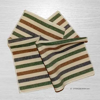 Shawl in a green striped jacket pocket (50976) 
Shawl in a green striped jacket pocket (50976)