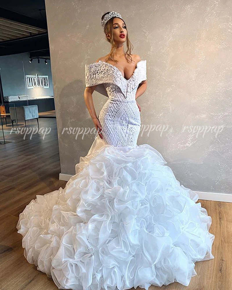 Luxury Mermaid Wedding Gowns V-neck Cap Sleeve Beaded Applique Lace White Dubai Women Wedding Dress 2019
Luxury Mermaid Wedding Gowns V-neck Cap Sleeve Beaded Applique Lace White Dubai Women Wedding Dress 2019