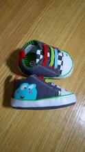 Nuevo 2 colores de lona clásicos de dibujo de rana zapatos para bebé de dibujos animados bebé recién nacido deportes zapatillas de deporte en primer lugar los caminantes botines zapatos mocasines