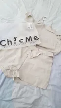 Top corto y liso sin mangas para mujer, pantalones largos ajustados de cintura alta, traje de dos piezas, conjunto de pantalones acampanados con cinturón