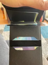 Bycobecy, billetera inteligente antirrobo con bloqueo Rfid para hombre, billetera Vintage de cuero PU, información de seguridad Unisex, Mini monedero de aluminio, nuevo